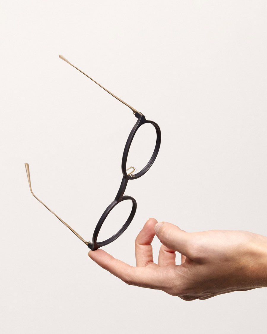 VIU Archetypes 3D-printed frame balanced on a fingertip